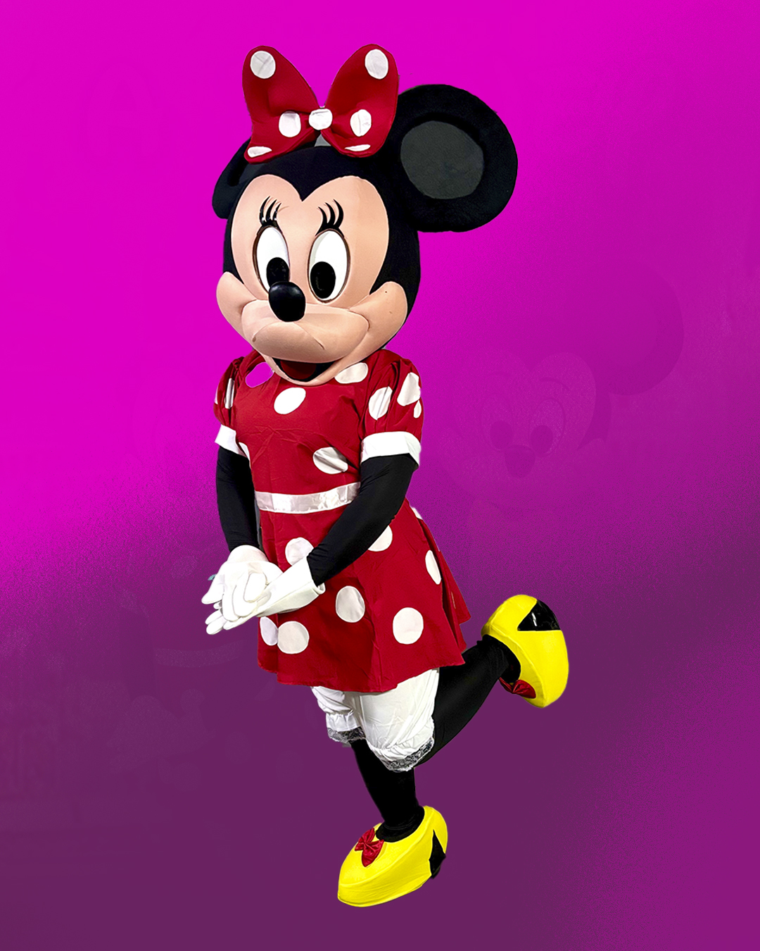Personagem Minnie Mouse com vestido vermelho de bolinhas